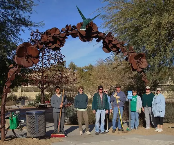 Volunteers tend to the Hummingbird Habitat at Desert Breeze Park in Chandler.